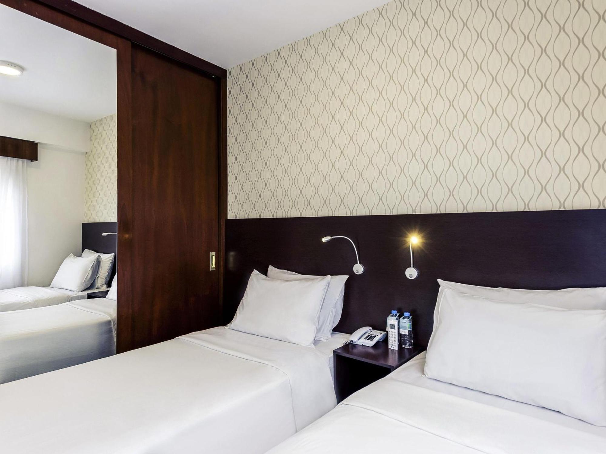 Quarto Superior com 2 Camas de Solteiro e Cozinha